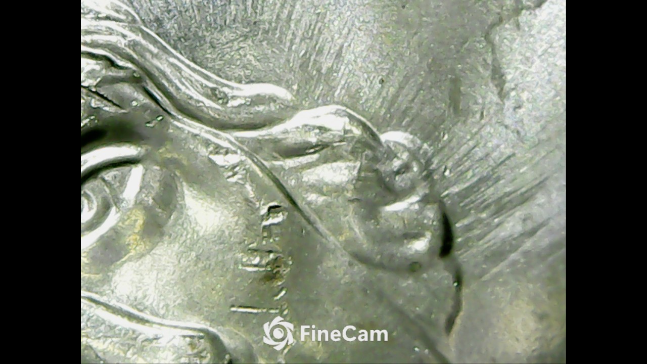 Is-This-Feeder-Finger-Damage-On-This-2023-D-Nickel?